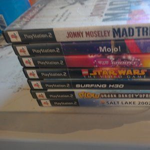 NWOT PS 2 games bundle  of 7 professionally refurbished disks with instuctions!